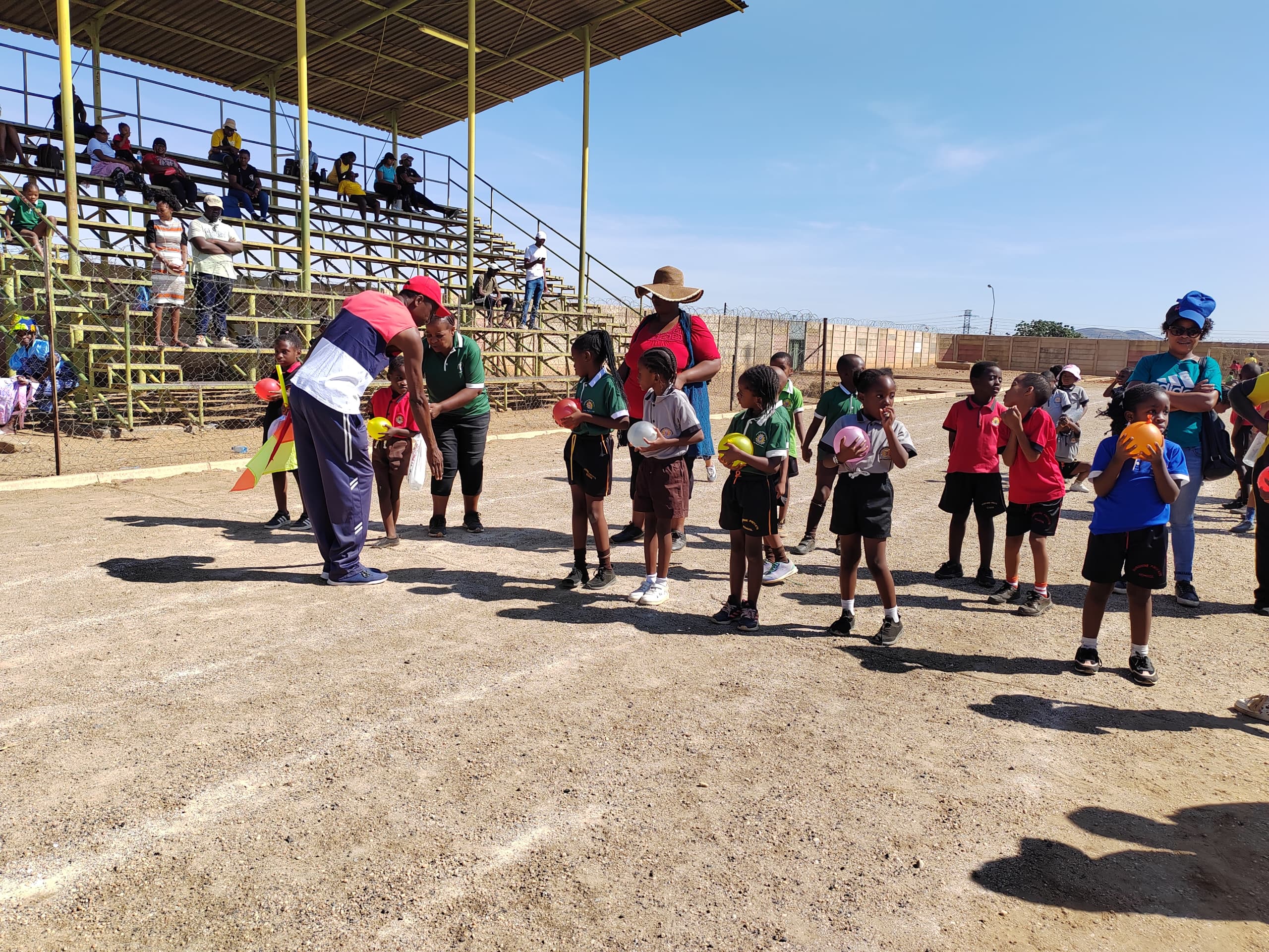 Athletes preparing for a race at a school sports event